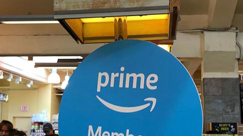 Whole Foods 'Prime Members Save More' Checkout Sign